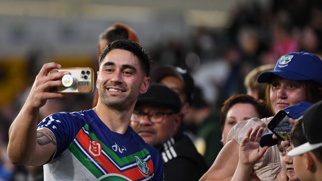 Sean Johnson takes a selfie with New Zealand fans.