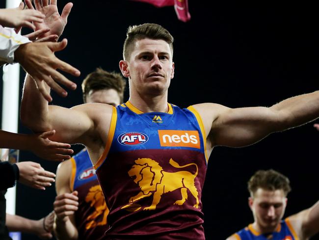 BRISBANE, AUSTRALIA - AUGUST 04: Dayne Zorko of the Lions celebrates winning during the round 20 AFL match between the Brisbane Lions and the Western Bulldogs at The Gabba on August 04, 2019 in Brisbane, Australia. (Photo by Chris Hyde/Getty Images)