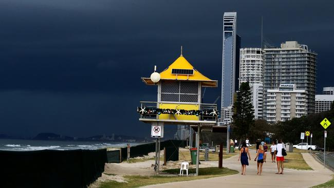 Storms roll over the Gold Coast, as captured in Surfers Paradise. Picture AAP/David Clark