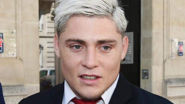Australian international James O'Connor (C) leaves after appearing before the French National Rugby League (Ligue Nationale de Rugby, LNR) disciplinary commission in Paris. Picture: AFP