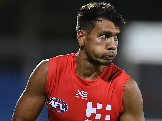 MACKAY, AUSTRALIA - MARCH 03: Callum Ah Chee of the Suns runs the ball during the 2019 JLT Community Series AFL match between the Gold Coast Suns and the Western Bulldogs at Great Barrier Reef Arena on March 03, 2019 in Mackay, Australia. (Photo by Ian Hitchcock/Getty Images)