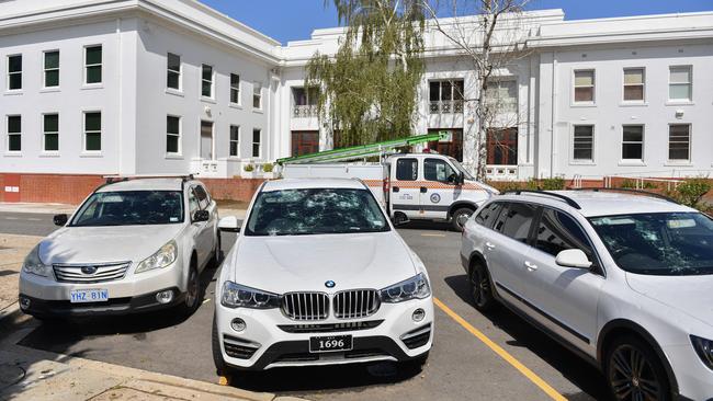 Hail-damaged cars outside Old Parliament House in Canberra. Picture: AAP