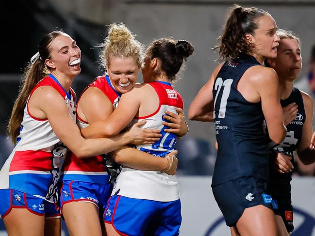 MELBOURNE, AUSTRALIA - OCTOBER 17: Analea McKee of the Bulldogs celebrates a goal during the 2024 AFLW Round 08 match between the Carlton Blues and the Western Bulldogs at Ikon Park on October 17, 2024 in Melbourne, Australia. (Photo by Dylan Burns/AFL Photos via Getty Images)