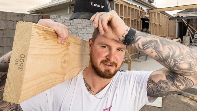 Jack Gale, 27  on a hot worksite. A new Aussie invention, the Wear Optimo, promises to provide outdoor workers and athletes real-time information on the effects of heat stress.  Picture: Jason Edwards