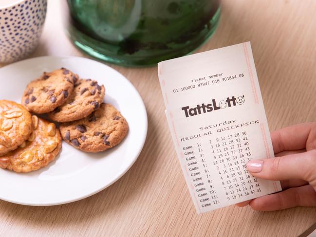 Woman has a cup of tea after winning lottery. Picture: TattsLotto