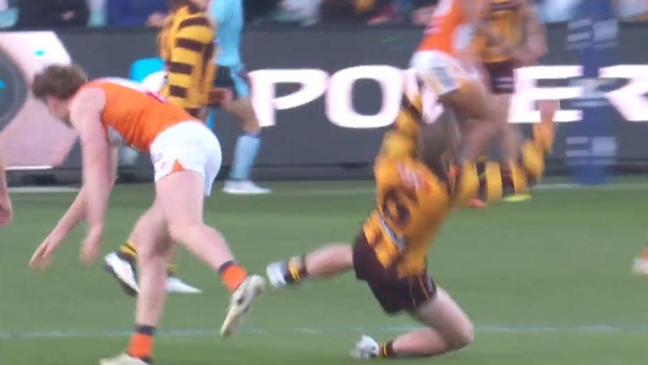 James Sicily falls to ground after being hit by Tom Green. Photo: Fox Footy.