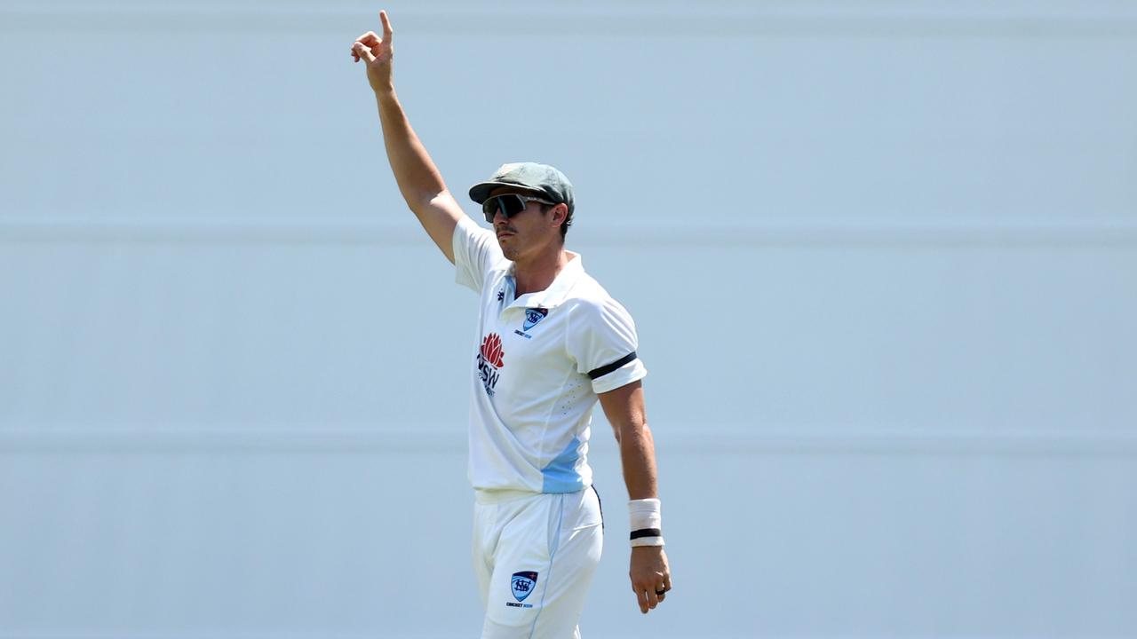 Abbott was emotional after the tribute but returned to the field to pick up three quick wickets as NSW put pressure back on Tasmania. Picture: Jason McCawley / Getty Images