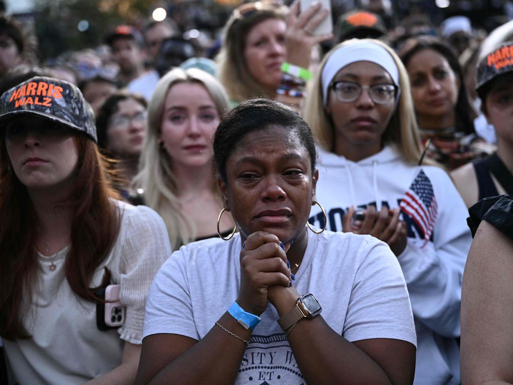 People react as US Vice President Kamala Harris gives her concession speech at Howard University in Washington, DC, on November 6, 2024. Picture: AFP