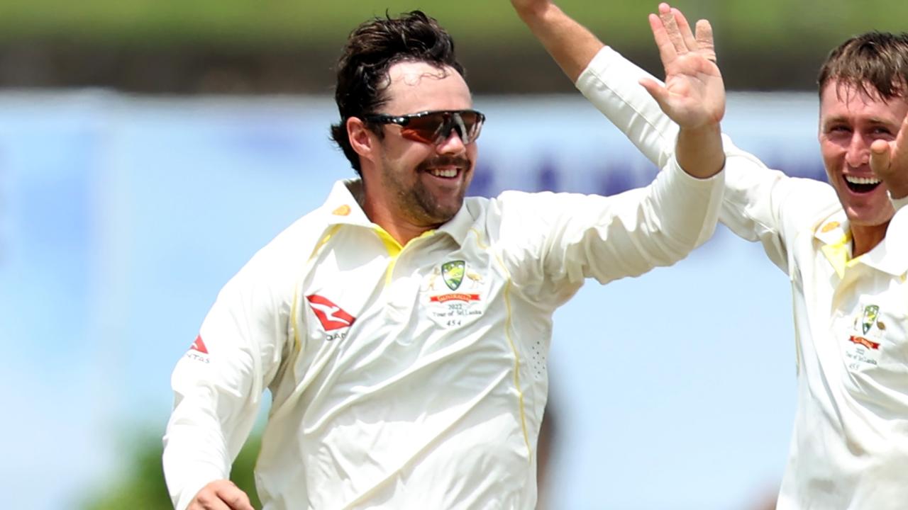 GALLE, SRI LANKA - JULY 01: Travis Head of Australia celebrates with teammates after dismissing Dinesh Chandimal of Sri Lanka during day three of the First Test in the series between Sri Lanka and Australia at Galle International Stadium on July 01, 2022 in Galle, Sri Lanka. (Photo by Buddhika Weerasinghe/Getty Images)