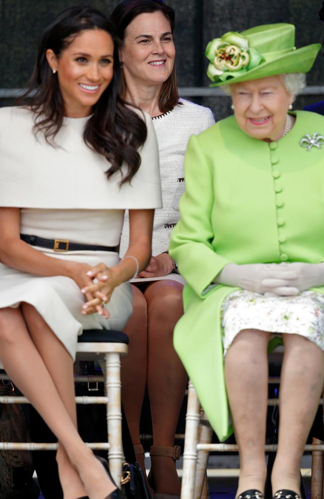 Prince Harry is thought to the be the Queen’s favourite grandson, and the affection has reportedly extended to his new bride, Meghan Markle, seen here on her first public engagement with the monarch. Picture: Phil Noble/Getty