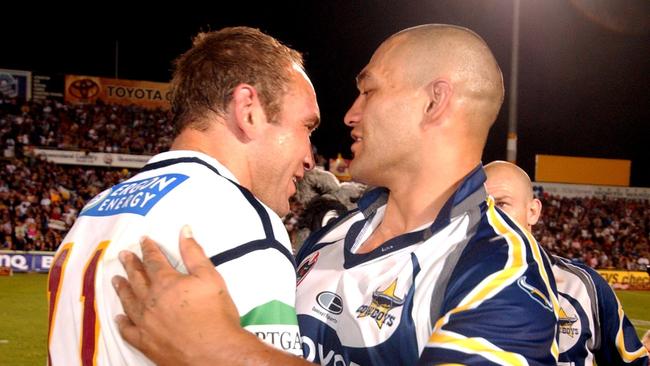 Gorden Tallis is embraced by Paul Rauhihi Picture: Scott Radford-Chisholm