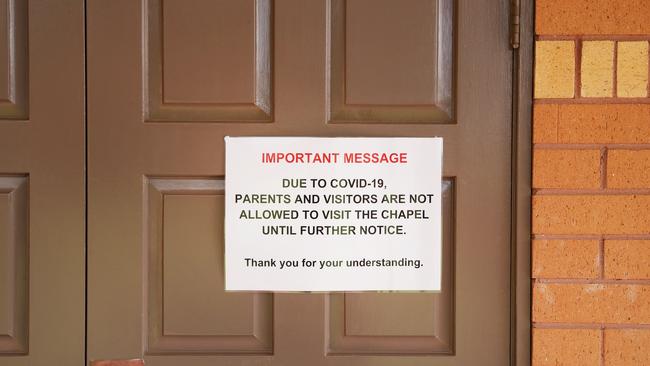 Pictured is a sign on the chapel door at Tangara School for Girls at Cherrybrook in Sydney that has been closed. Picture: Richard Dobson