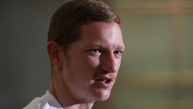 SYDNEY, AUSTRALIA - JUNE 15:  Kye Rowles speaks to the media after arriving at Sydney International Airport on June 15, 2022 in Sydney, Australia. The Australian Socceroos qualified for the 2022 FIFA World Cup with a win in their sudden death playoff qualification match against Peru. (Photo by Matt King/Getty Images)