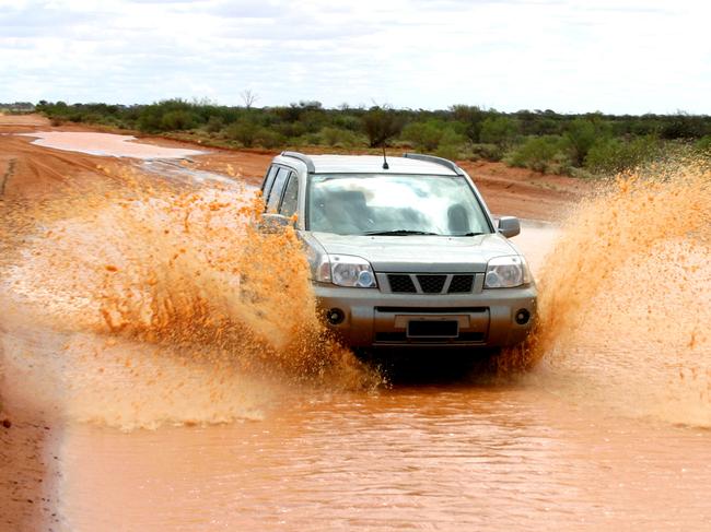 4WDriving IIIgeneric, thinkstock, 4WD, mud, 4 wheel driving, outback, Nissan, car wash, muddy car