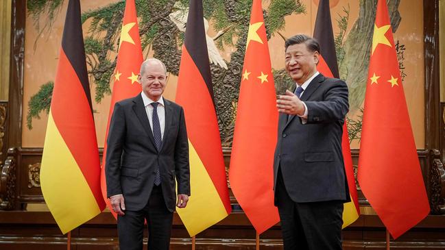 Xi Jinping welcomes Olaf Scholz to Beijing’s Great Hall of the People on Friday. Picture: AFP