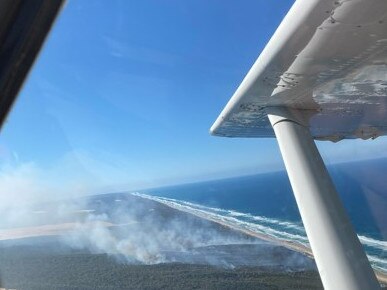 A fire burns above K'gari. PHOTO: Air K'gari (formerly Air Fraser).