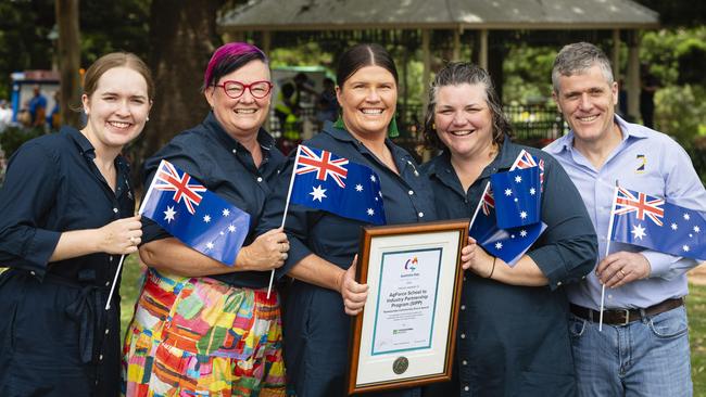 The Moo Baa Munch event, run by AgForce School to Industry Partnership Program is named the Toowoomba Community Event award recipient, representing AgForce are (from left) Lucy Gunther, Tanya Nagle, Emily Kenny, Kellie Blinco and Michael Guerin at Toowoomba Australia Day celebrations at Picnic Point, Sunday, January 26, 2025. Picture: Kevin Farmer