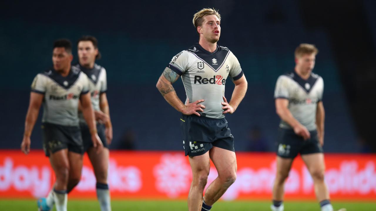 SYDNEY, AUSTRALIA - JULY 23: Cameron Munster of the Storm looks on during the round 19 NRL match between the South Sydney Rabbitohs and the Melbourne Storm at Stadium Australia on July 23, 2022 in Sydney, Australia. (Photo by Jason McCawley/Getty Images)