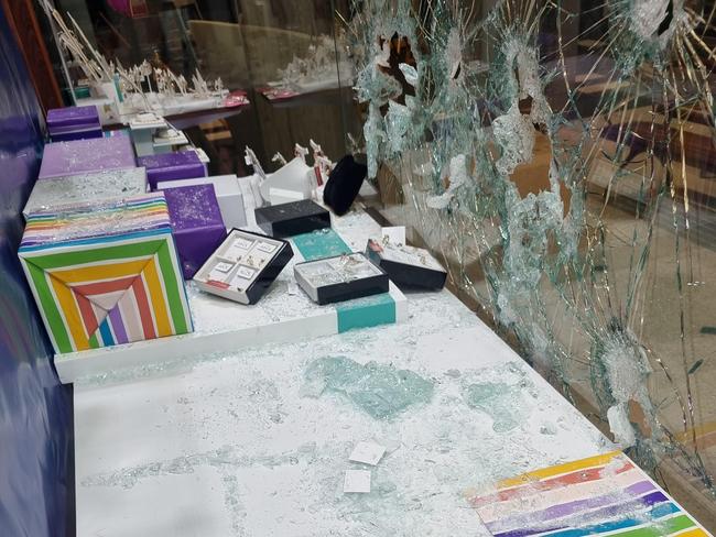 The aftermath of the break in shows an empty cabinet and broken glass (Photo: Larissa Walsh)