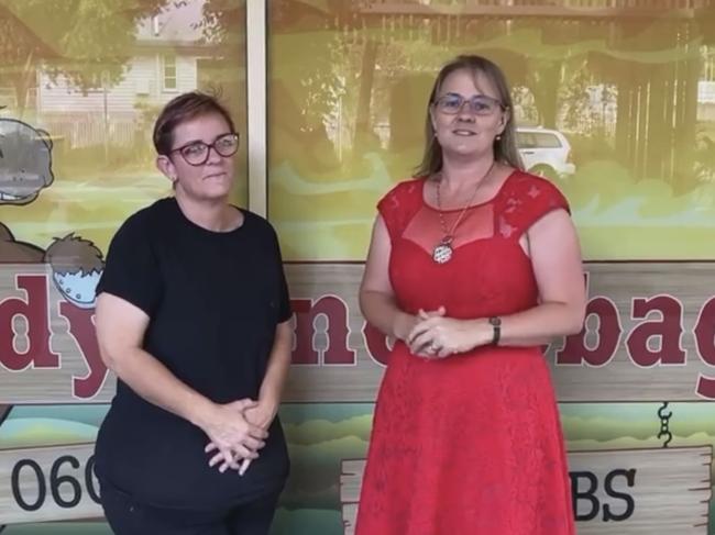 Neddy's Nosebag takeaway owner Lesley Wooler and Glasshouse Country Chamber of Commerce President Jenny Broderick celebrate online carols.