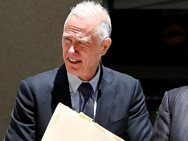 BRISBANE, AUSTRALIA - NewsWire Photos JANUARY 28, 2025: Gold Coast lawyer Beau Hartnett (white hair in left of photo), with his barrister Richard Cowen, leaves the Federal Court where he attending a hearing into his personal insolvency. Picture: NewsWire / John Gass