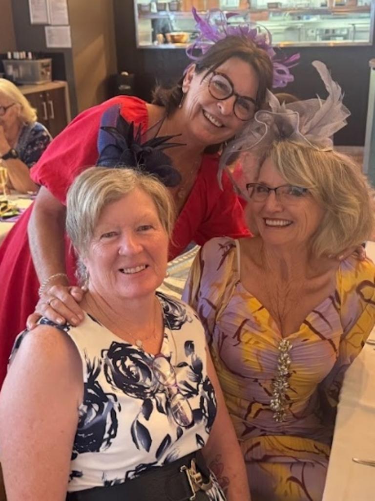 Deb Krause, Jen MacKellar, and Norelle Meredith celebrating the Melbourne Cup at Gympie RSL Club.