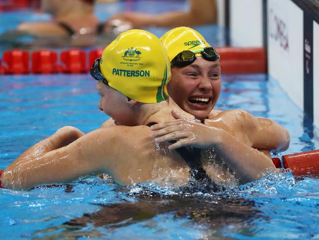 RIO DE JANEIRO, BRAZIL - SEPTEMBER 16: Maddison Elliott (R) of Australia is congratulated after winning the gold medal by her team mate and silver medalist Lakeisha Patterson (L) celebrates winning the gold medal in the Women's 50m Freestyle - S8 Final on day 9 of the Rio 2016 Paralympic Games at the Olympic Aquatic Stadium on September 16, 2016 in Rio de Janeiro, Brazil. (Photo by Buda Mendes/Getty Images)