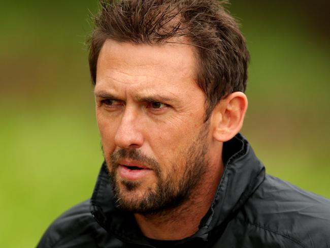 Coach Tony Popovic during warm up for their training session for their game against Guangzhou Evergrande at Pirtek Stadium .Picture Gregg Porteous