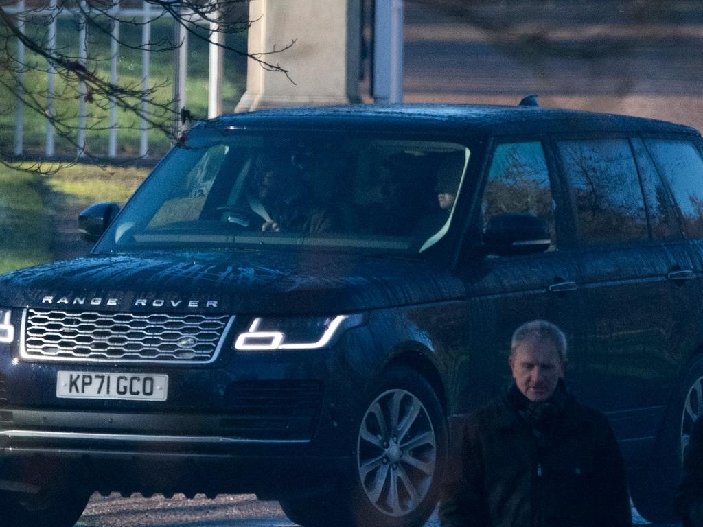 Prince Andrew, seated in the rear of this Range Rover, was driven from his house near Windsor Castle in Berkshire. Picture: AFP