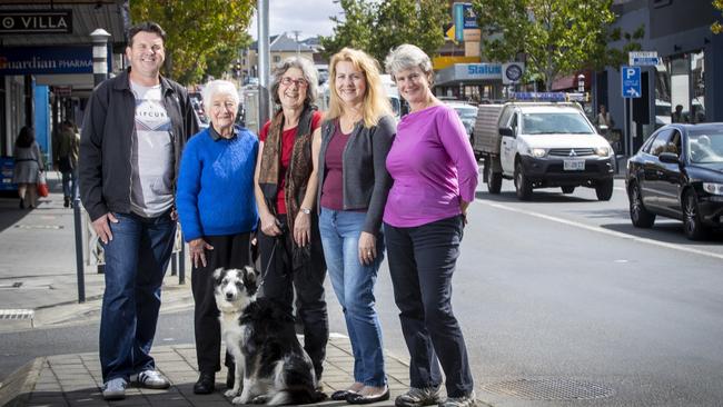 North Hobart residents Dean Bassam, Robyn Mathison, Veronica McShane holding dog Juno, Sandra Bassam and Jenny Smith shared their feedback on the area with council. Picture: LUKE BOWDEN