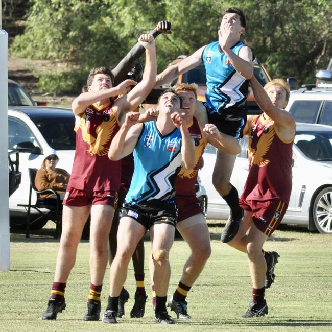 Southern Mallee Thunder coach Kieran Delahunty launches himself over the pack. Picture: Georgia Hallam