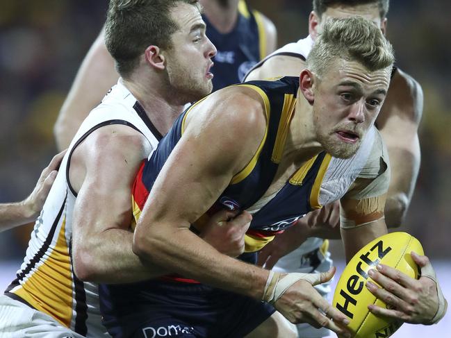 AFL - Adelaide Crows v Hawthorn - Round 14 - Adelaide Oval. Hugh Greenwood under pressure. Picture Sarah Reed