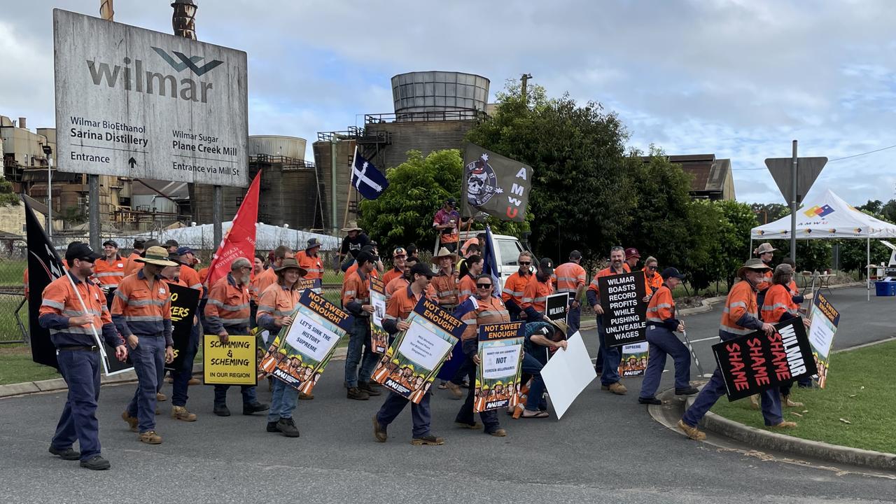 The striking workers, stationed outside the Plane Creek mill along the Bruce Highway, were unable to speak out alone for fear of repercussions from Wilmar. Photo: Fergus Gregg