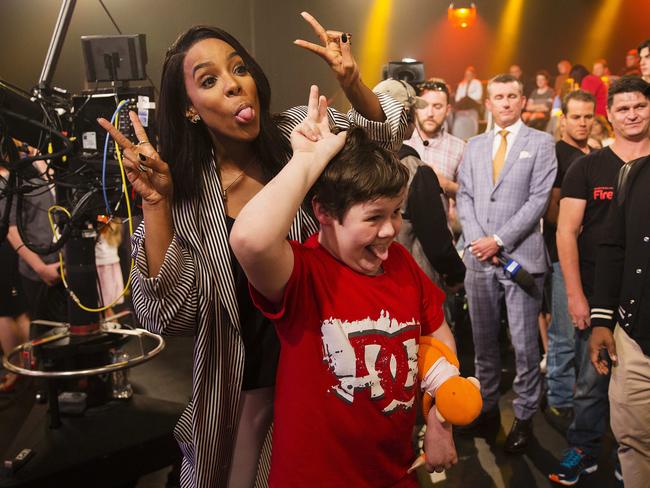 Rowland meets James Wheeler, 12, during the telethon. Picture: Justin Lloyd