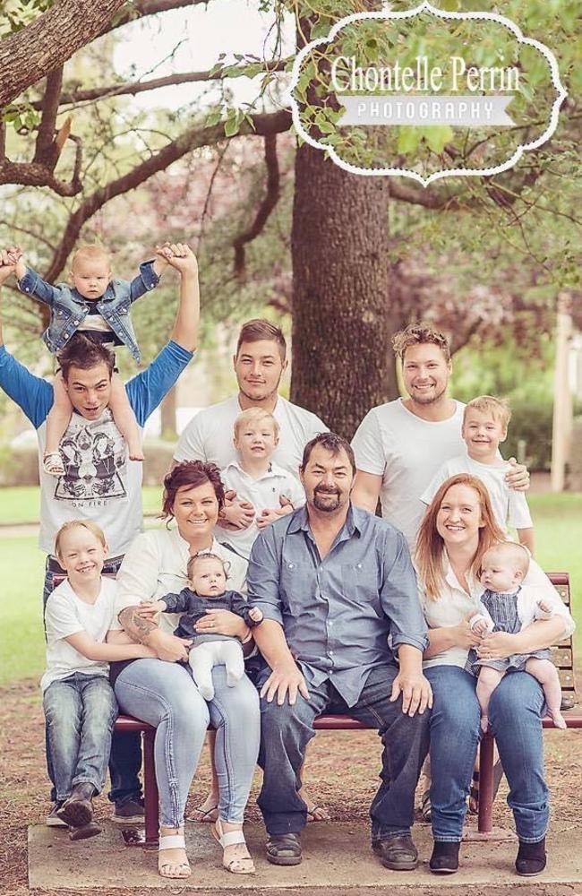 Hairdresser Jaye Edwards with his family. His sister Skye (purple hair left) and father, Dean, have both died of MND. Jaye has the gene for the illness. Picture: Chontelle Perrin