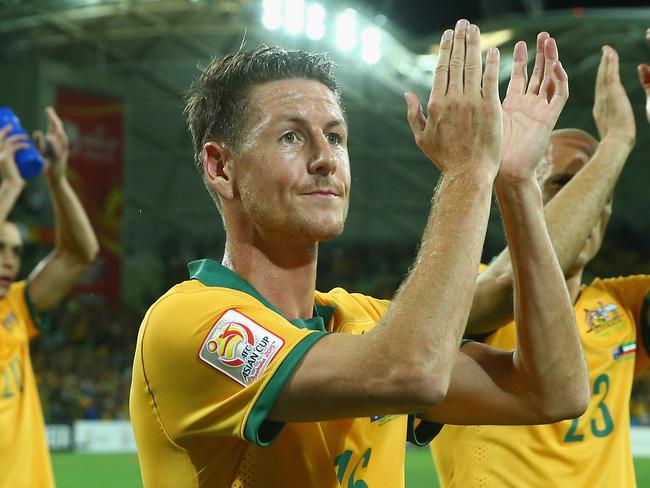 MELBOURNE, AUSTRALIA - JANUARY 09: Nathan Burns of Australia celebrates after Australia defeated Kuwait during the 2015 Asian Cup match between the Australian Socceroos and Kuwait at AAMI Park on January 9, 2015 in Melbourne, Australia. (Photo by Robert Cianflone/Getty Images)