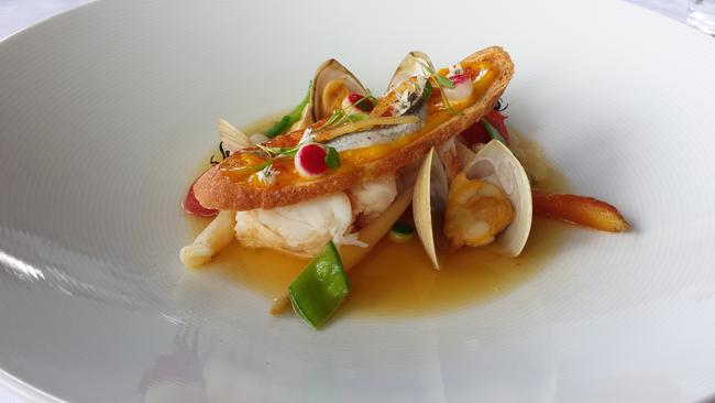 Butter poached crayfish tail with Cloudy Bay Diamond shell clams, organic ricotta cavatelli, preserved meyer lemon, rouille, boquerón, tomato consommé, sel rouge.