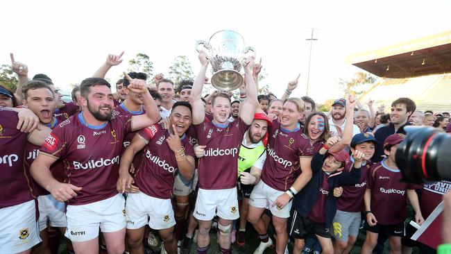 University celebrate their victory last year. Picture: AAP/Richard Gosling