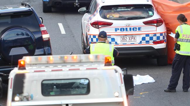 Police at the scene of the suspected fatal accident on Hale St. Picture: Peter Wallis