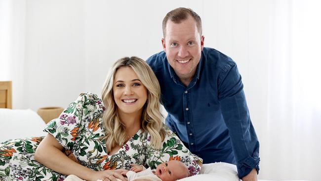 Channel 7’s Kendall Gilding at home with husband Tim Morgan and 1-week-old Moses. Pics Tara Croser.