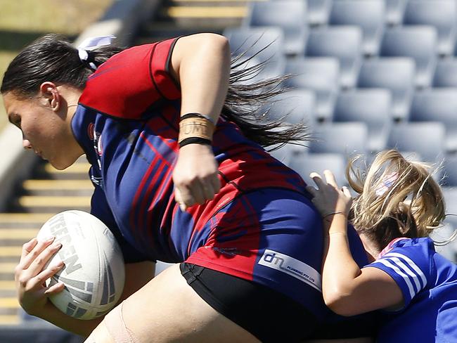 Campbelltown Collegians' Italia Nuku-Mariner takes a power of stopping. Picture: John Appleyard