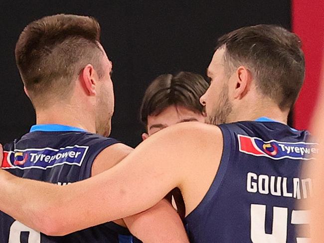 MELBOURNE, AUSTRALIA - OCTOBER 15: Matthew Dellavedova of United is assisted by Chris Goulding of United after a collision during the round three NBL match between Melbourne United and Brisbane Bullets at John Cain Arena, on October 15, 2023, in Melbourne, Australia. (Photo by Kelly Defina/Getty Images)