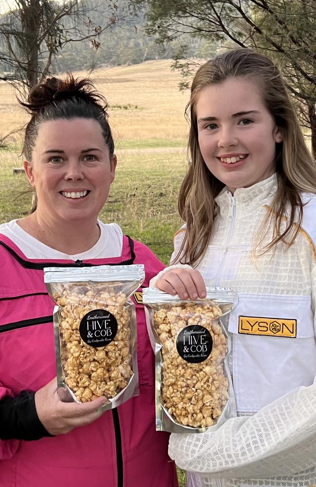 Richmond teen Audrey Long, 13, pictured here with mum Anita, is the driving force behind Hive &amp; Cob leatherwood popcorn. Picture: Supplied/ Coolgardie Farm