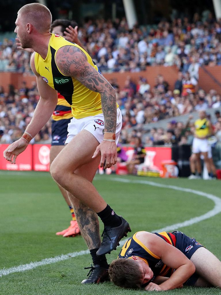 Broad walks away from Parnell. (Photo by Sarah Reed/AFL Photos via Getty Images)