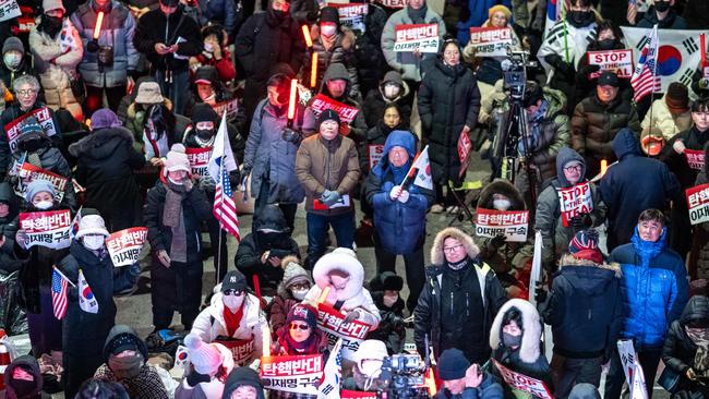 Thousands of Yoon Suk Yeol’s supporters are camped outside his residence in Seoul. Picture: AFP.