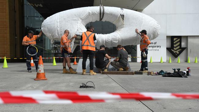Workers install Secret World of a Starlight Ember by artist Lindy Lee outside the Museum of Contemporary Art in Sydney. Picture: Joel Carrett / NCA NewsWire