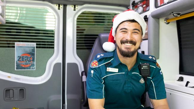 COPYRIGHT WARNING for Moreton Life ONLY. Phone Kylie Knight 3480 8226. QAS officer in charge Ben Lu is ready for Christmas.