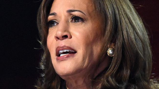 TOPSHOT - US Vice President and 2024 Democratic presidential candidate Kamala Harris speaks on the fourth and last day of the Democratic National Convention (DNC) at the United Center in Chicago, Illinois, on August 22, 2024. (Photo by SAUL LOEB / AFP)