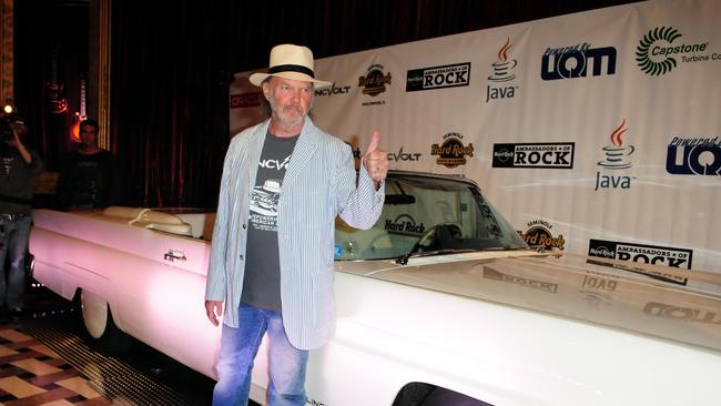 Neil Young with LincVolt, his hybrid Lincoln Continental. Picture: WireImage