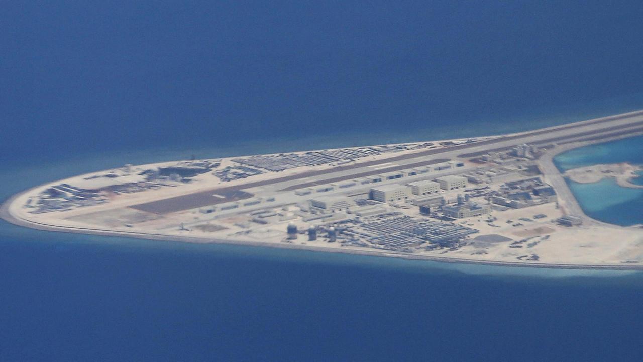 An airstrip, structures and buildings on China’s man-made Subi Reef in the Spratly chain of islands in the South China Sea, pictured in 2017. Picture: Bullit Marquez/AP
